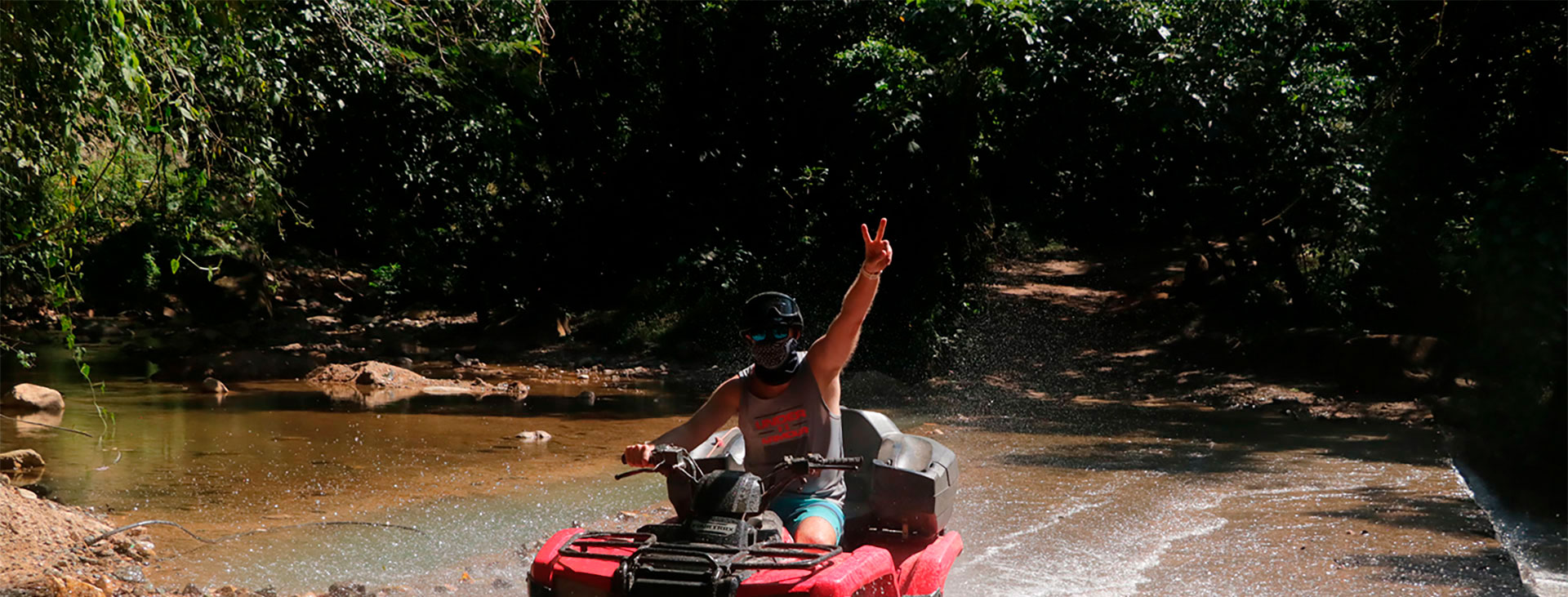 2. Participants enjoying a zipline adventure while exploring natural landscapes on an ATV. Fun and action guaranteed.