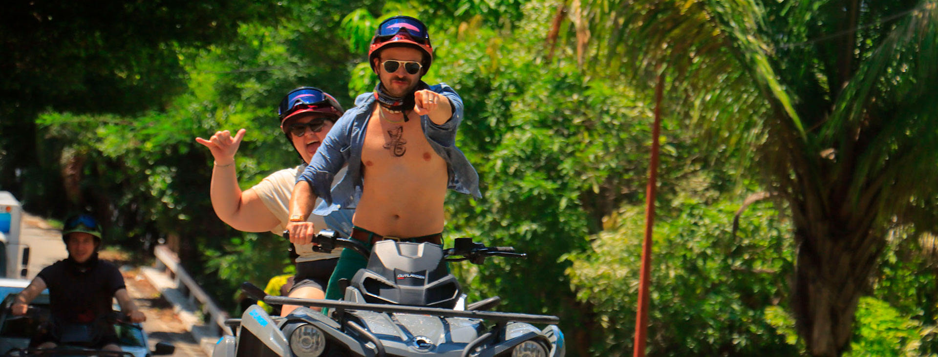 7. Adventurers on ATVs ready to enjoy a zipline adventure in the midst of stunning natural landscapes.