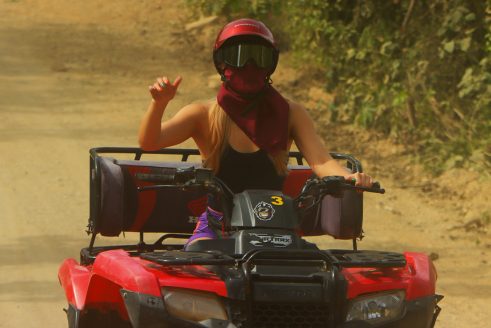 Off-road UTV Crossing A River Effortlessly, Showcasing The Power And Adventure Of A Side By Side Vehicle In Nature's Challenging Terrain.